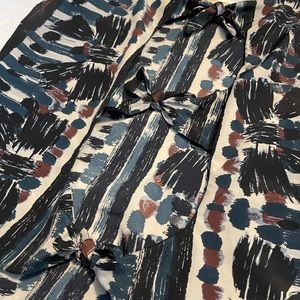 Fun open back 3 tie blouse